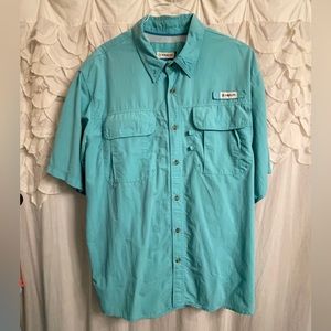 Magellan short sleeve fishing shirt. Turquoise color. Size XXL.